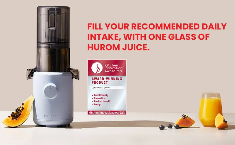 Estrattore di succo accanto a centrifuga su bancone cucina