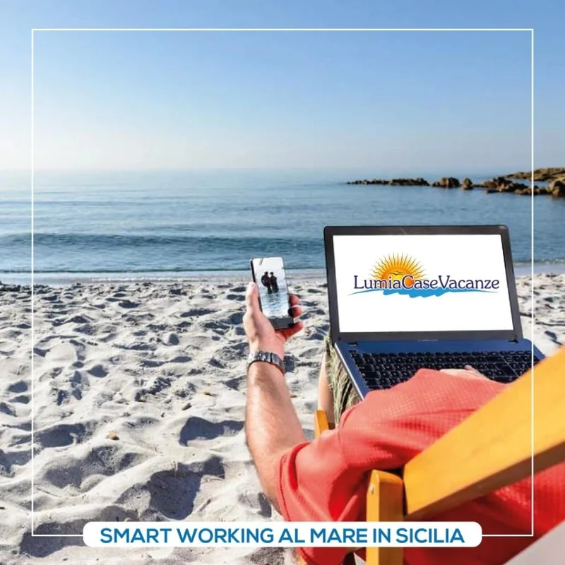 Smart-working vacanza ufficio mobile workation laptop spiaggia montagna